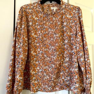 NWOT. Fun blouse. Ruffles and flowy